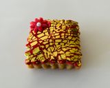 A picture of step 4 of How to use gold leaf with fondant.