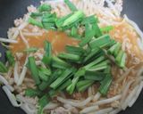 A picture of step 4 of Kimchi Cheese Ramen Hot Pot.