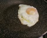 A picture of step 2 of Fried egg and bacon sarnie.