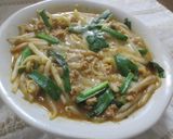 A picture of step 6 of Kimchi Cheese Ramen Hot Pot.