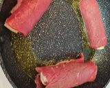 Foto del paso 4 de la receta Rollito de ternera relleno de jamón y queso en salsa de pimentón
