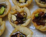 A picture of step 14 of Raisins-Pistachio Baklava.