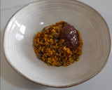 Foto del paso 15 de la receta: Arroz de carrilleras al vino tinto con habitas