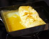 A picture of step 6 of Fluffy Japanese Rolled Omelet with Shirodashi.