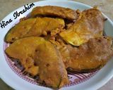 A picture of step 6 of Baingan pakorhay.