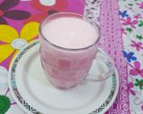A picture of step 2 of Rooh afza/Ice cream shake.