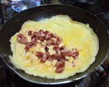 Foto del paso 5 de la receta: Receta de Omelette de jamón y queso estilo Diner