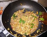 A picture of step 3 of Stir-Fried Minced Pork with Holy Basil and Century Eggs.