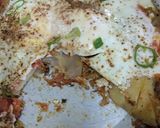 A picture of step 10 of Poached Eggs with spicy Tomatoes and Potato.
