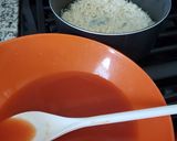 A picture of step 1 of Red rice with chicken legs and potatoes.