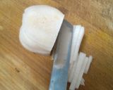 A picture of step 1 of Thor Muri Ghonto (Banana Stem cooked with Rice).