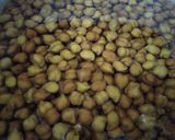 A picture of step 1 of Desi-Style Chana Aloo (Desi-Style Chickpea and Potato Curry).