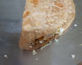 A picture of step 6 of Mexican chicken Quesadilla.