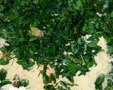 A picture of step 2 of Mixed millet partha with bathua and methi leaves.