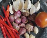 Foto langkah ke 1 dari resep Cumi masak hitam khas madura.
