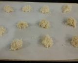 A picture of step 5 of Coconut Macaroon s with a Chocolate Center.