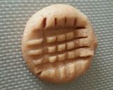 A picture of step 7 of Authentic American Peanut Butter Cookies.