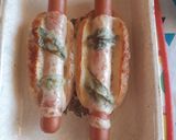 Foto del paso 3 de la receta: Panchos con albahaca y muzarella al horno