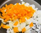 A picture of step 2 of Meatless Enchilada Pie.