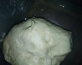 A picture of step 4 of Sweet potato curl rolls.