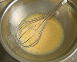A picture of step 3 of Thick Fluffy Pancakes Using Pancake Rings and Mix.