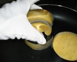 A picture of step 7 of Thick Fluffy Pancakes Using Pancake Rings and Mix.