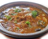 A picture of step 8 of LEHSUNI PANEER gravy.