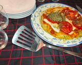 Foto del paso 22 de la receta Tortilla de brócoli con sobre mesa de tomate