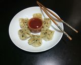 A picture of step 8 of Chicken open momo.