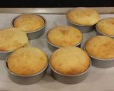 A picture of step 12 of Vanilla Butter Cakes filled and Frosted with Whipped White Chocolate Rasberry Ganache.