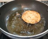 A picture of step 7 of Urad dal puri.