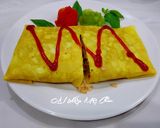 Hình bước làm 3 của món Cơm chiên cá mòi bọc trứng
