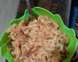 A picture of step 8 of Italian pasta in red sauce.
