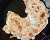 A picture of step 6 of Egg paratha.