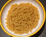 A picture of step 1 of Macaroni with garlic butter and veg.