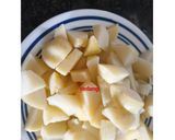 A picture of step 2 of Aloo Pulav.