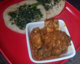 A picture of step 39 of Kulcha and bhuna chicken masala.
