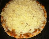 A picture of step 3 of Stove Top Chicken Tikka Pizza.