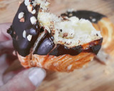 Foto del paso 19 de la receta: Espiral de hojaldre relleno de crema de melocotón y chocolate