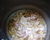 A picture of step 1 of Tomato rice with peas.