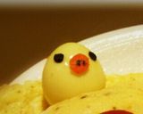 A picture of step 11 of Rilakkuma Omurice.