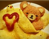 A picture of step 12 of Rilakkuma Omurice.