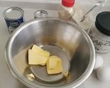 A picture of step 1 of Blueberries and vanilla frosted cup cakes.