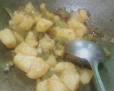 A picture of step 3 of Potatoes And capsicum veg.