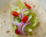 A picture of step 2 of How to please the kiddies BBQ and chicken nugget wraps.