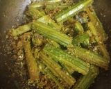 A picture of step 1 of Moringa poriyal(drumstick fry).