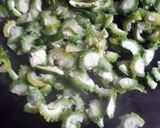 A picture of step 2 of Bitter Gourd fry.