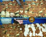 A picture of step 8 of Italiano Sushi Or Aubergine Rolls.