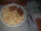 Fries, sausage and kachumbari