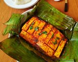 A picture of step 14 of Paneer wrapped in banana leaf.